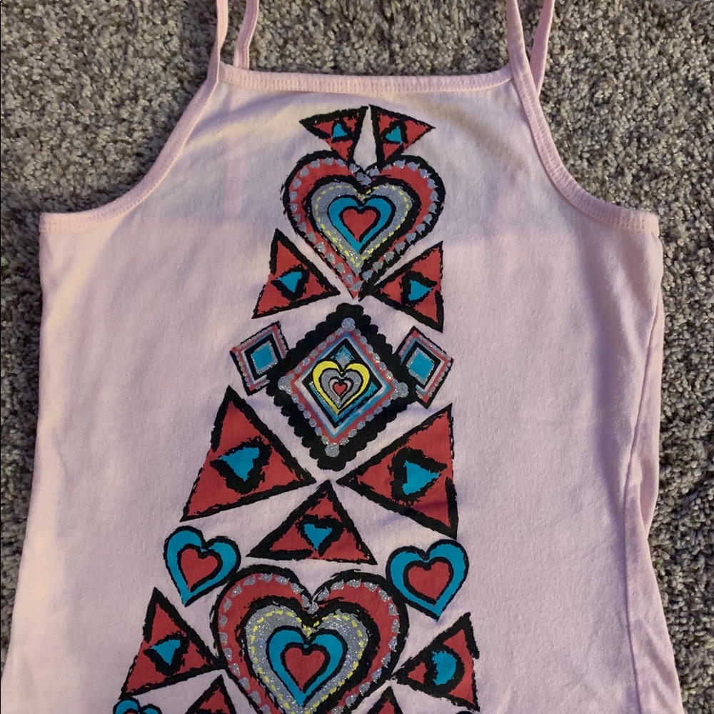Pink tank top with geometric design